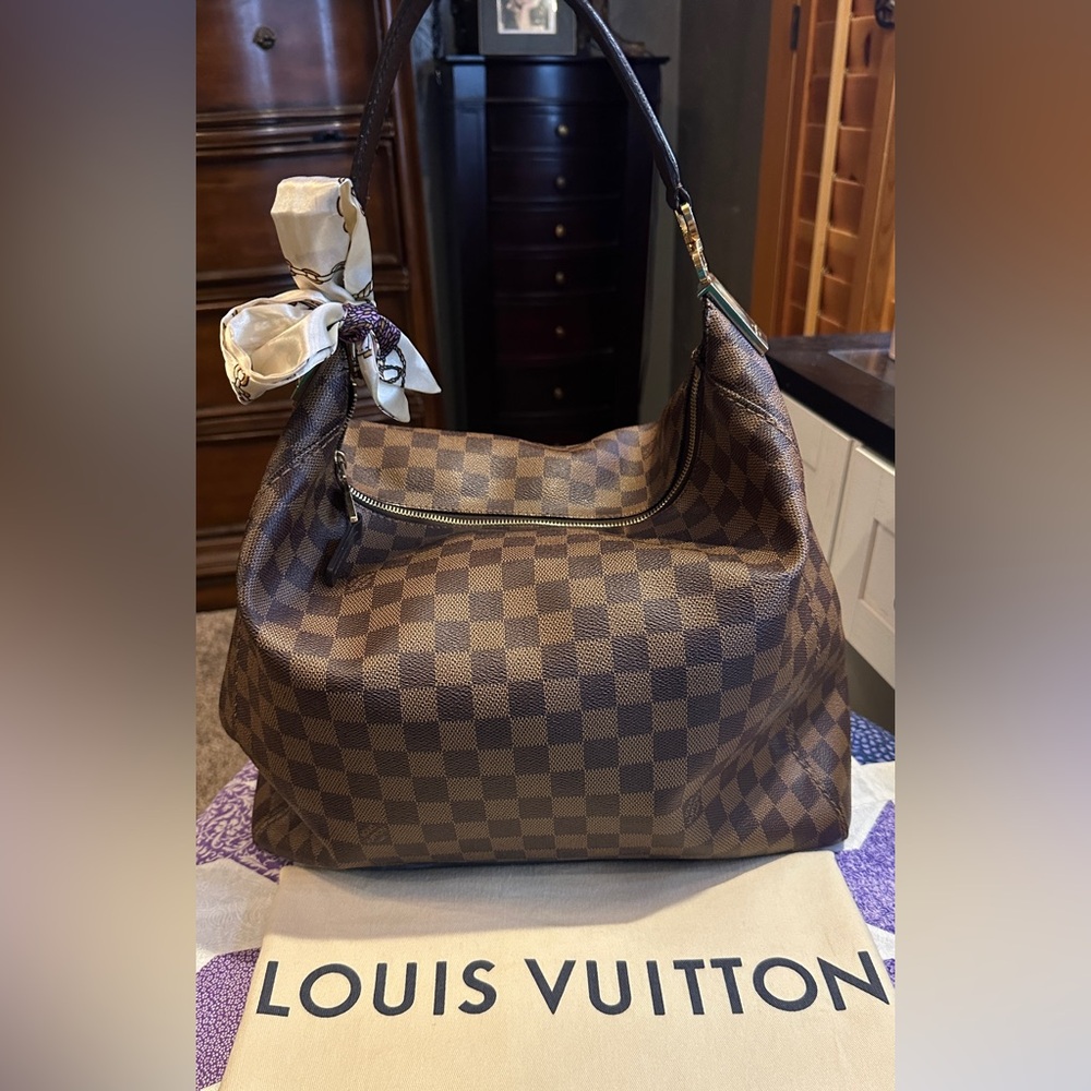 AUTHENTIC LV portebello gm with dustbag included. ( the handle been replaced)